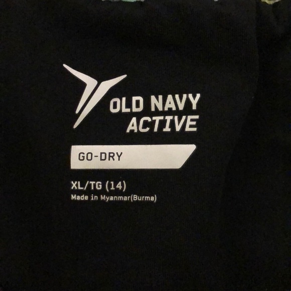 Sports shorts with multicoloured flowers - Picture 3 of 3